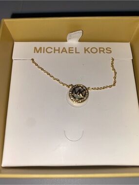 Michael Kors Gold Tone MK Circle Pendant Necklace with Crystal Accents